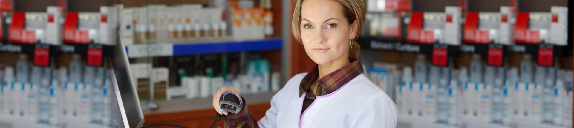 female pharmacist holding prescription
